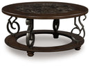 Frallyn - Round Cocktail Table - Dark Brown